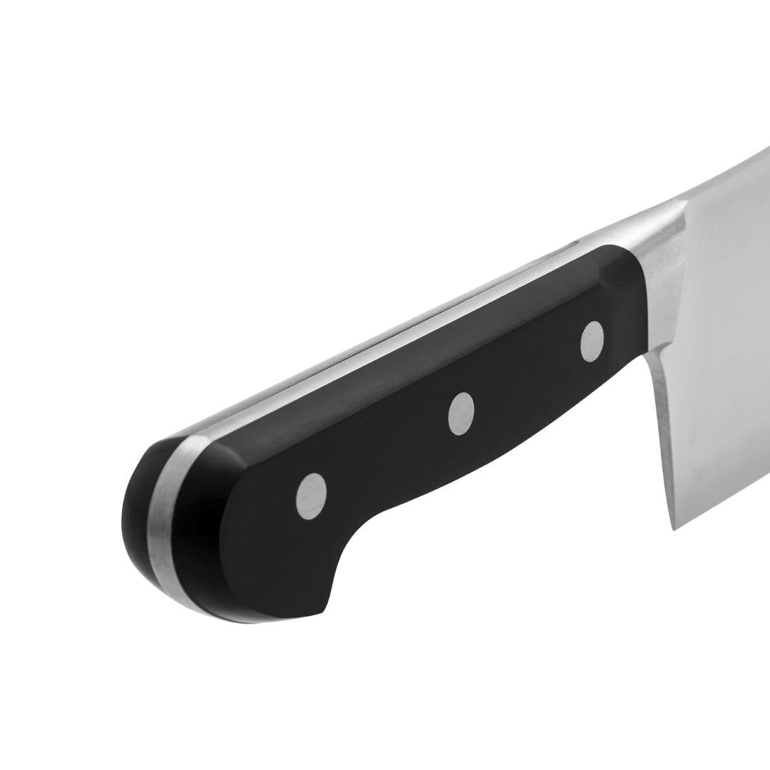 Close-up of Zwilling meat cleaver handle showing triple-riveted design and full-tang construction
